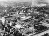 Motorenwerke Mannheim AG, vorm. Benz, Abt. stat. Motorenbau: Luftbild vom Herzogenried mit dem Industriehafen im Hintergrund. Rechts von der Bild-Mitte das Straenbahndepot Hohwiesenstrae