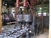 Dampf-Brikettpresse: Dampfmaschine: Brikettauslauf der Zweistrangpresse